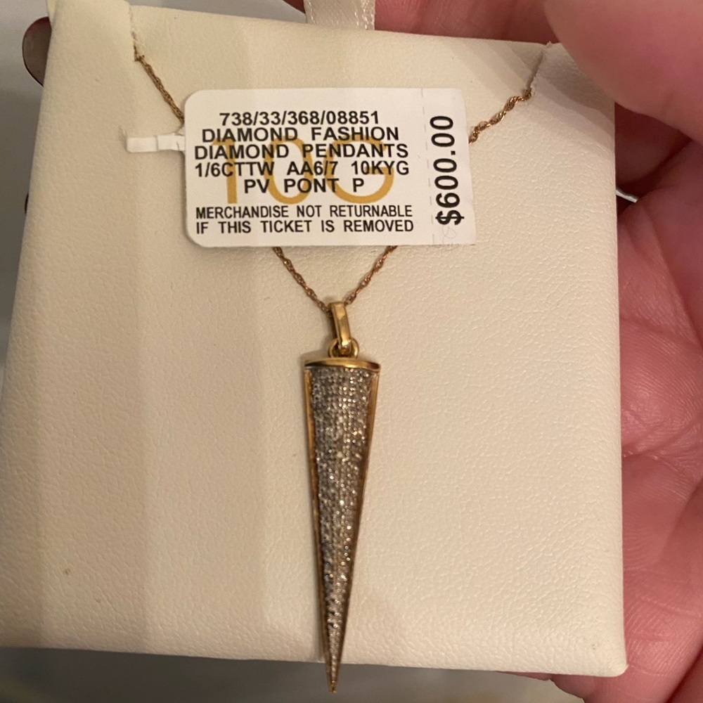 10 KT gold Diamond Triangle Pendant on 10 kt 20”chain